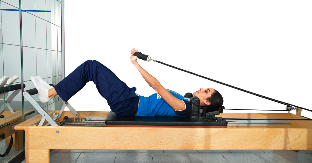 Health Sub-Niches- A Picture of a Woman Undergoing Pilates Workouts